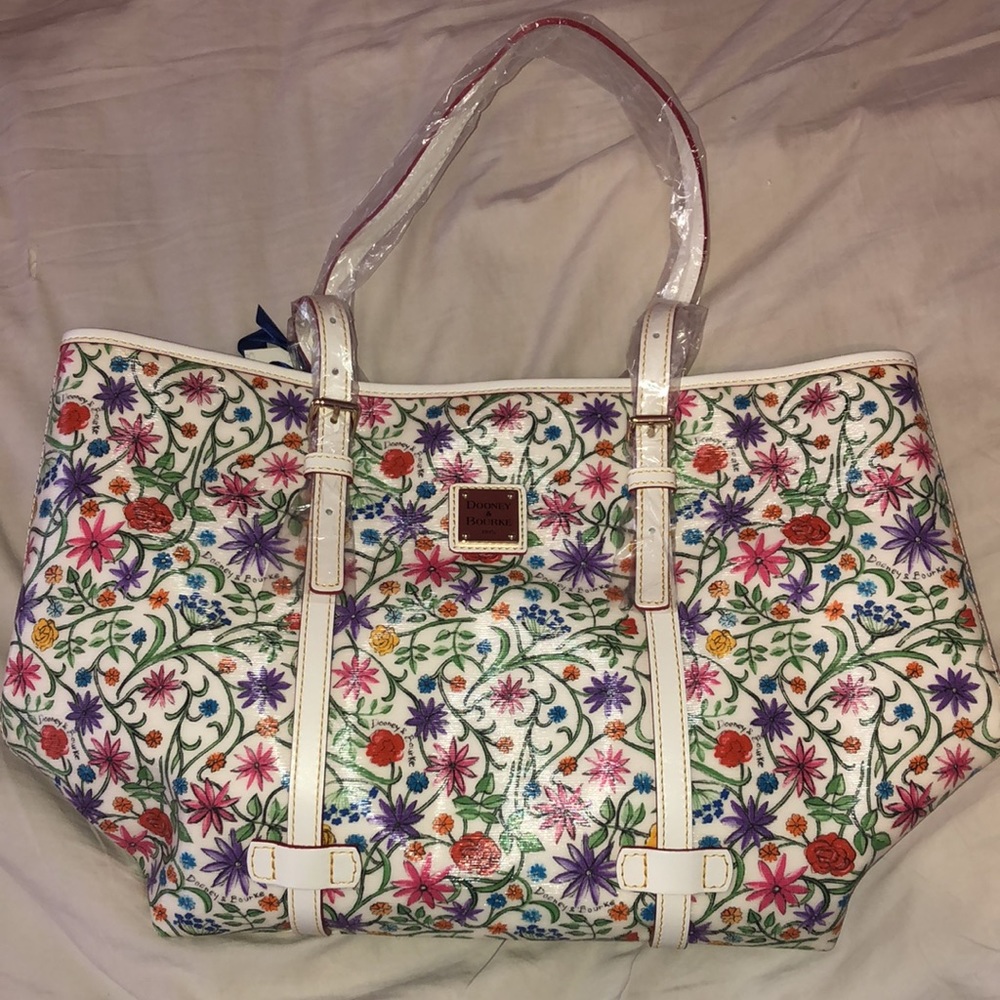 White shoulder bag with floral design